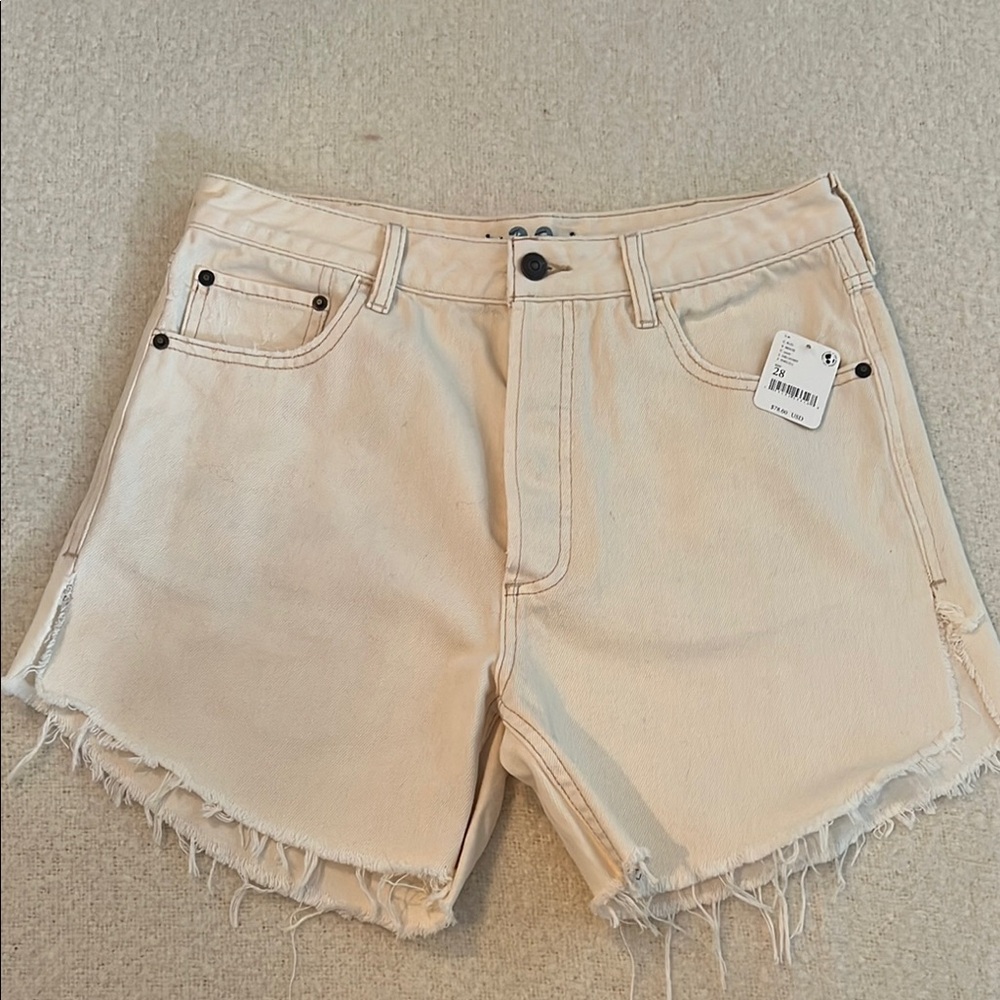 We The Free Cream Jean Shorts with Frayed Hem and High-Waisted Design